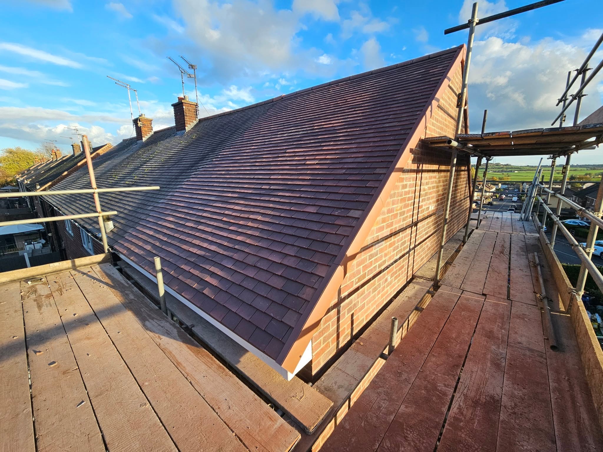 Tiled roof on a brick property